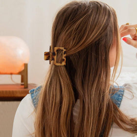 Interesse clip used in half-up hairstyle illustrating easy everyday styling