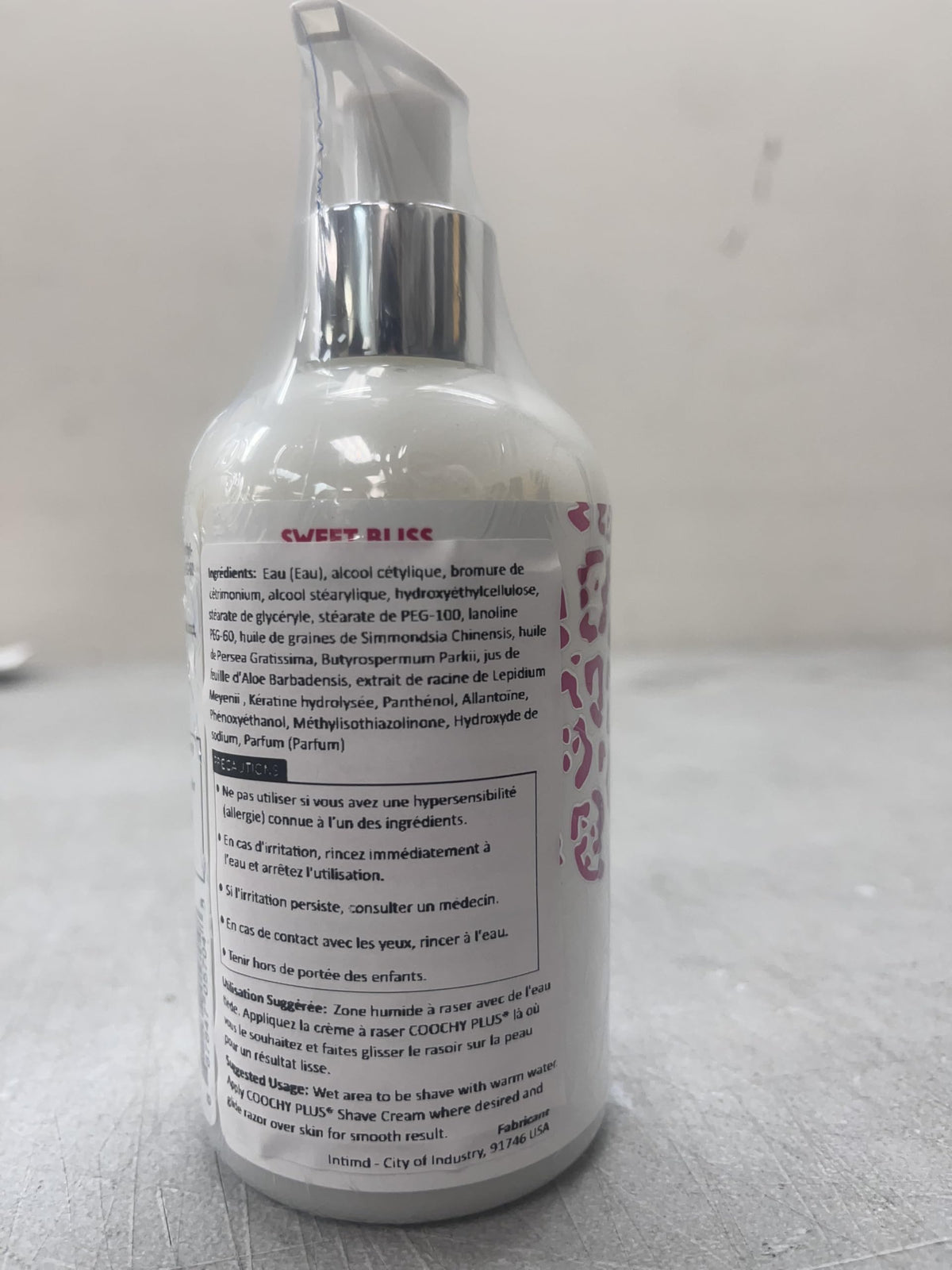 IntiMD Coochy Plus 8.5oz bottle on bathroom counter showing daily-use benefit