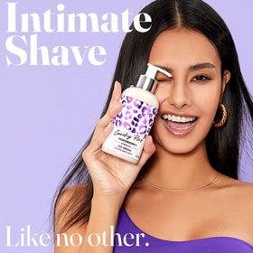 IntiMD Coochy Plus cream texture close-up highlights rich moisturizing feel for softer hair