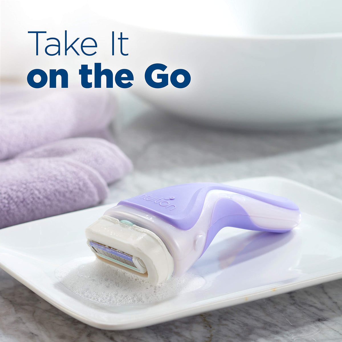 INTUITION Schick in bathroom setting for quick, moisturizing grooming