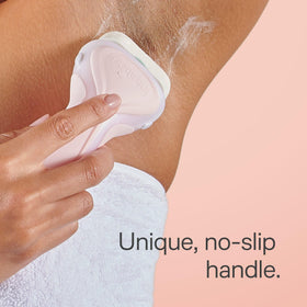 INTUITION razor shaving leg to show smooth, conditioned results