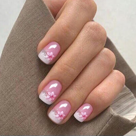 IQXGE strips applied on nails in-hand, demonstrating neat immediate result