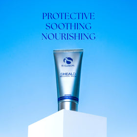 iS CLINICAL applying recovery balm to cheek illustrating soothing relief after treatments