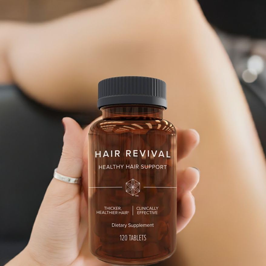 Isagenix serving size held in hand to show tablet scale and convenient daily dosage