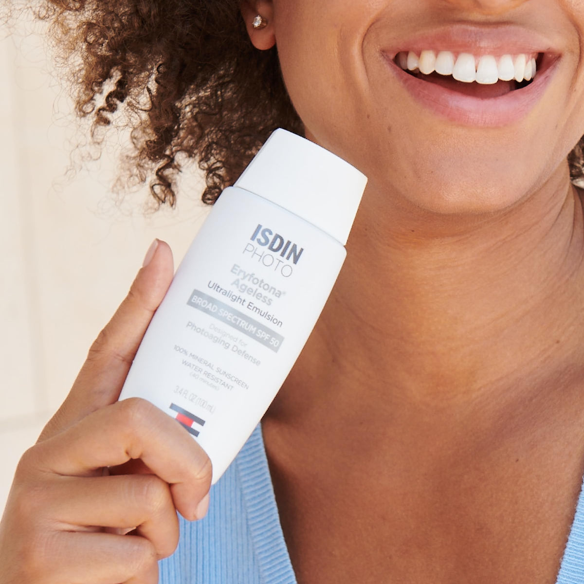 ISDIN close-up of sunscreen texture highlighting lightweight spreadability
