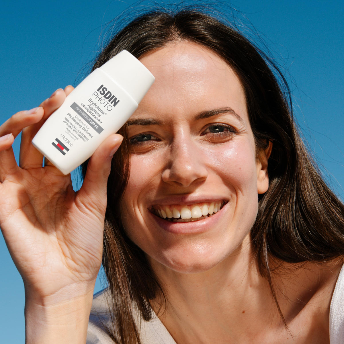 ISDIN cream texture close-up highlighting smooth blendability benefit