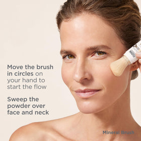 ISDIN brush placed with makeup items showing compatibility benefit