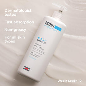 ISDIN Uradin 10 applied on arm showing immediate spreadability and reduced dryness