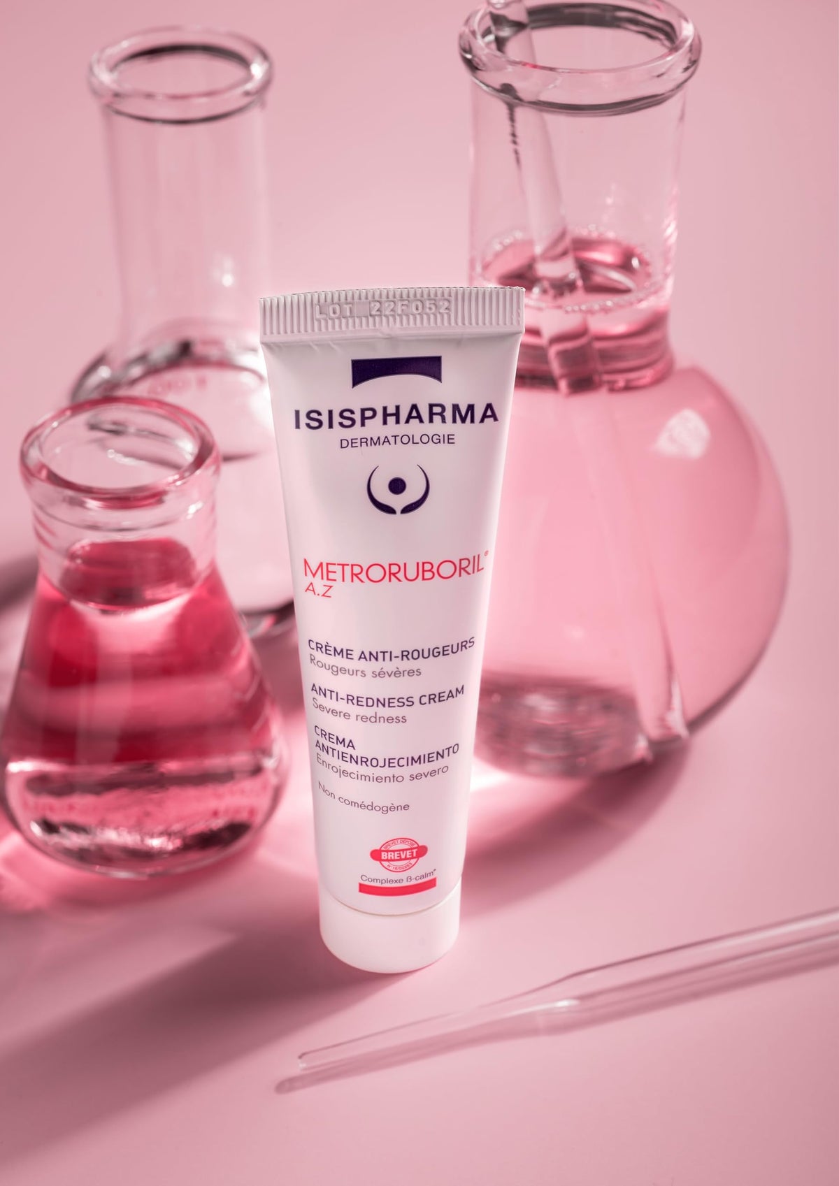 IsisPharma applying cream to cheek offering targeted redness relief