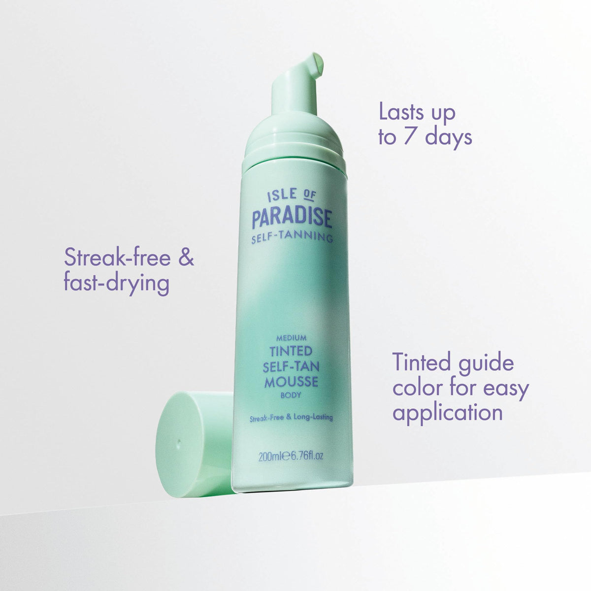 Isle of Paradise label detail highlighting oils and vegan formulation