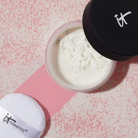 IT Cosmetics powder on vanity with tools highlighting everyday use and polished results