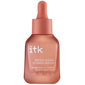 ITK brightening serum front packaging showing the bottle and label, promotes radiance