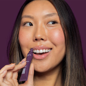 ITK lifestyle image in bag highlighting on-the-go lip care benefit