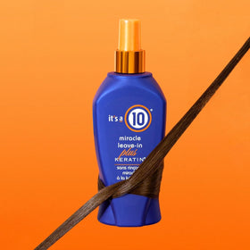 It's a 10 close-up of keratin-infused mist highlighting smoothing texture and shine benefits