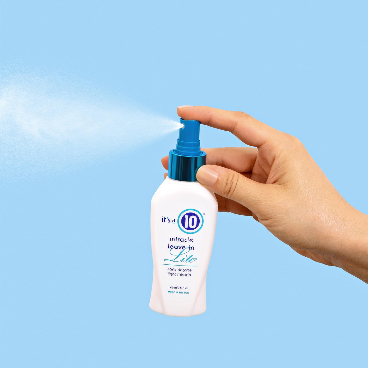 It's A 10 spray texture closeup producing fine mist for even, weightless coverage