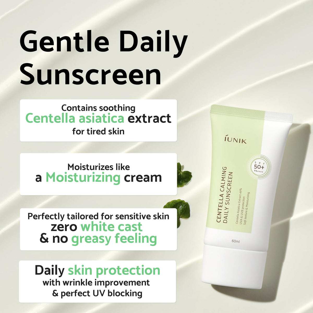 Hand applying IUNIK Centella sunscreen on cheek showing smooth matte finish and fast absorption
