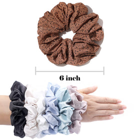 IVARYSS wrapped into a loose bun, showing gentle, crease-free styling benefit