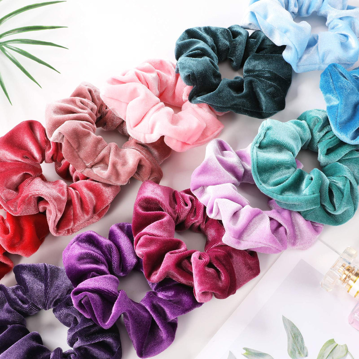 IVARYSS stacked scrunchies beside a ruler showing 4.3-inch diameter scale