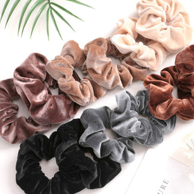 IVARYSS scrunchie worn in high ponytail demonstrating reliable grip during activities