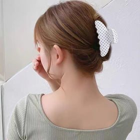Ivyu half-up hairstyle in lifestyle setting showing stylish, easy everyday wear
