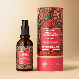The Ayurveda Experience front bottle view showing elegant label and oil clarity benefits hydration