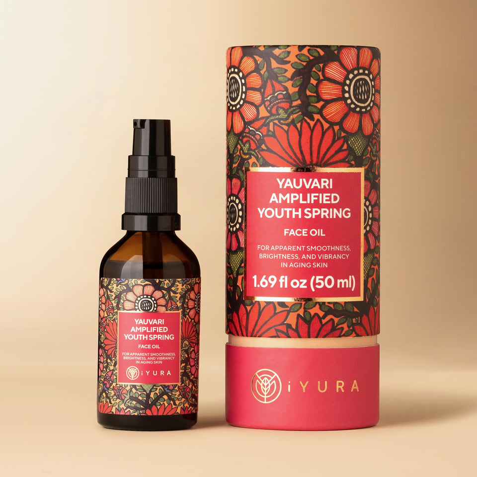 The Ayurveda Experience front bottle view showing elegant label and oil clarity benefits hydration