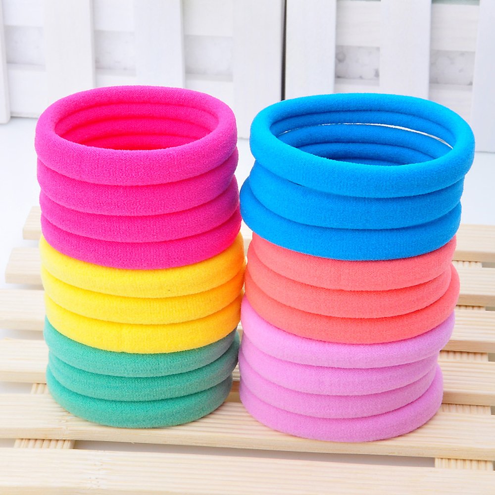 J-MEE mixed color hair bands styled on a vanity illustrating quick outfit coordination
