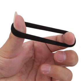 J-MEE hair band next to hand for size comparison and easy grip