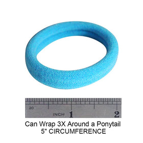 J-MEE hair band next to a hand to show scale and easy wrapping for thick hair