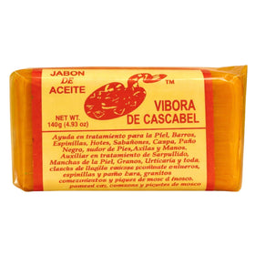 JABON DE ACEITE VIBORA DE CASCABEL front packaging showcasing 140g bar and branding benefit