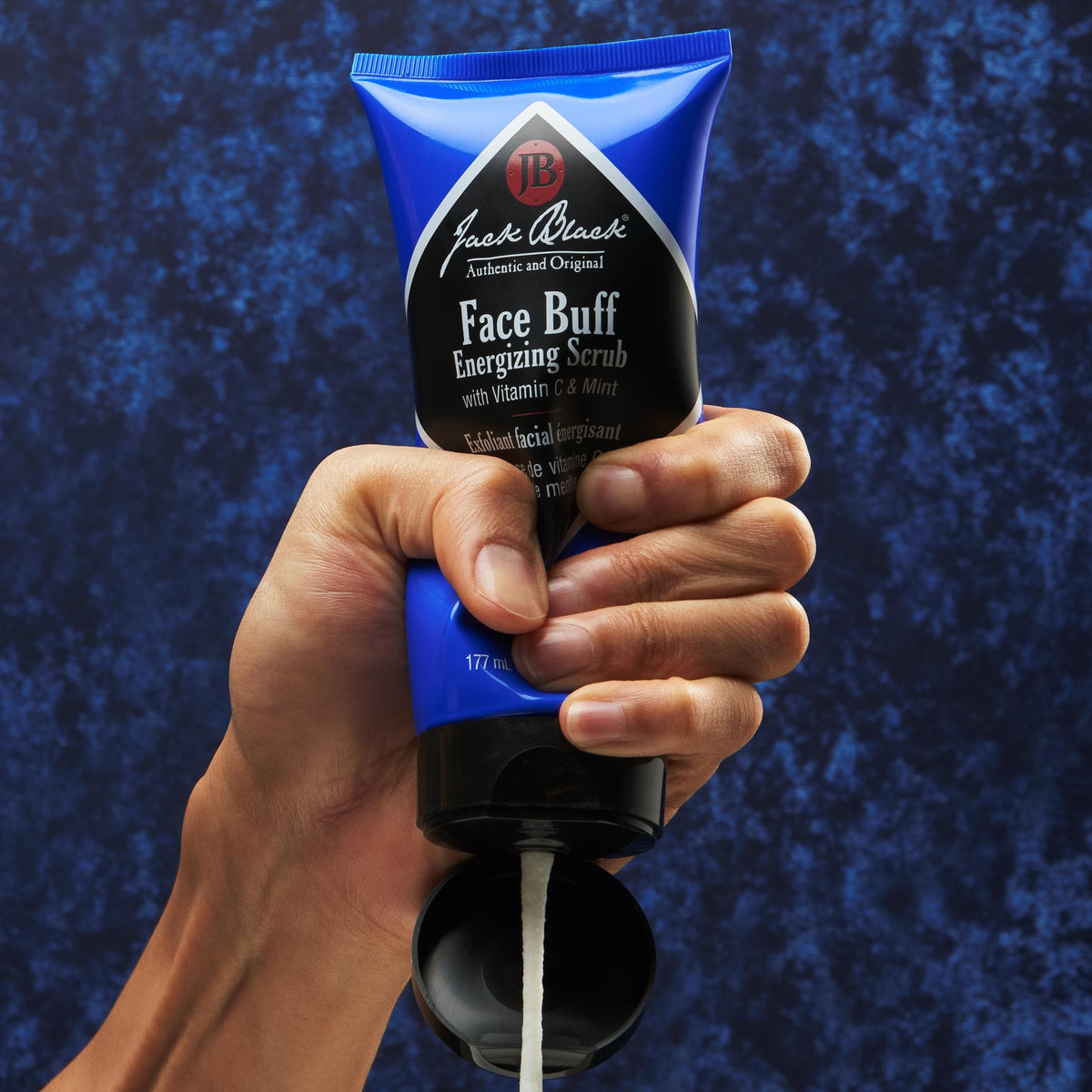 Jack Black texture close-up revealing bamboo powder exfoliant for gentle polish