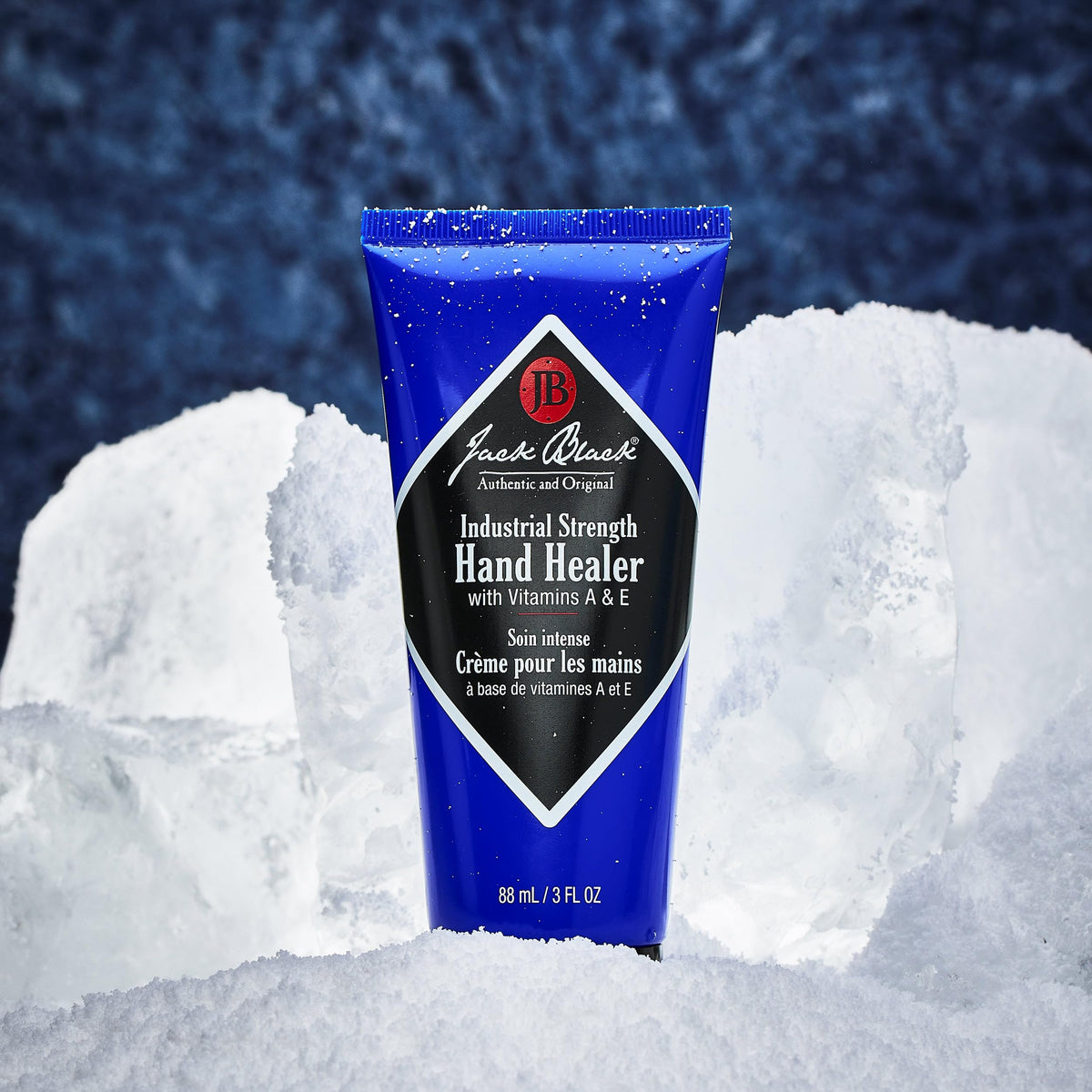 Jack Black tube beside a golf glove illustrating portable 3 fl oz size