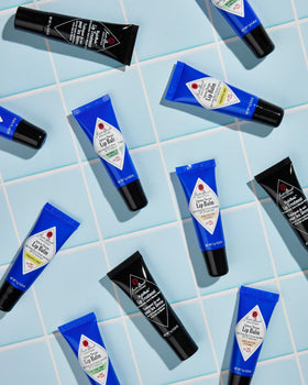 Jack Black balm used outdoors on a hiker showcasing sun protection