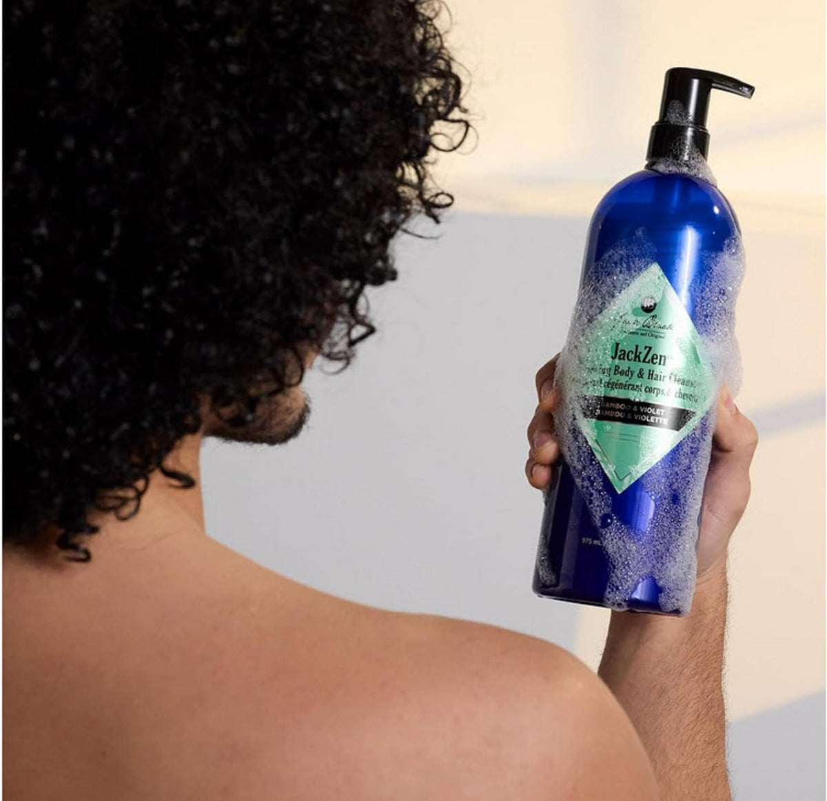 Jack Black JackZen in a shower being applied to hair and skin for dual-purpose use
