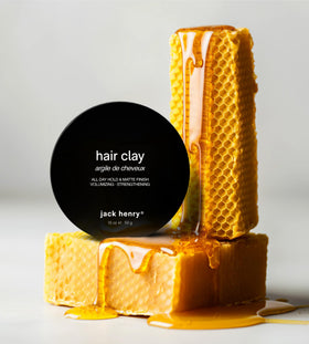 Jack Henry jar on bathroom shelf in lifestyle scene showing everyday grooming benefit