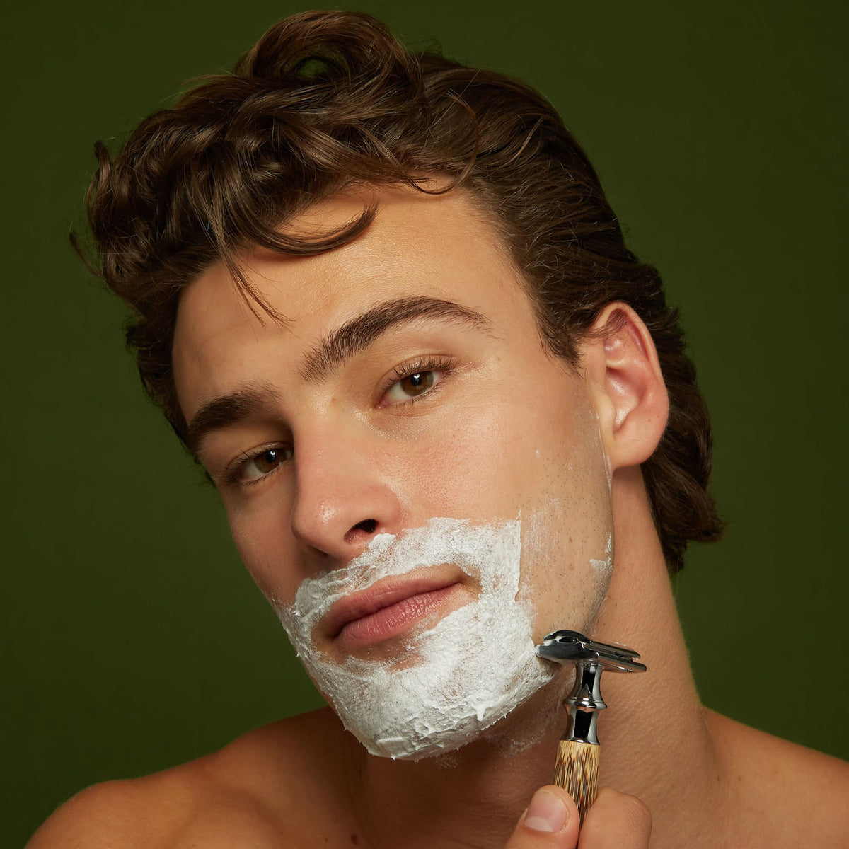 Jackfir shave cream applied on face illustrating smooth glide benefit