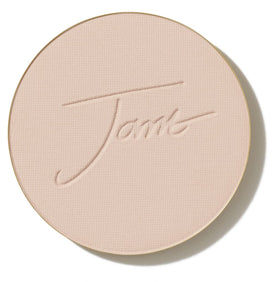 jane iredale front view of light beige refill pan showing smooth pressed surface and benefit: even coverage