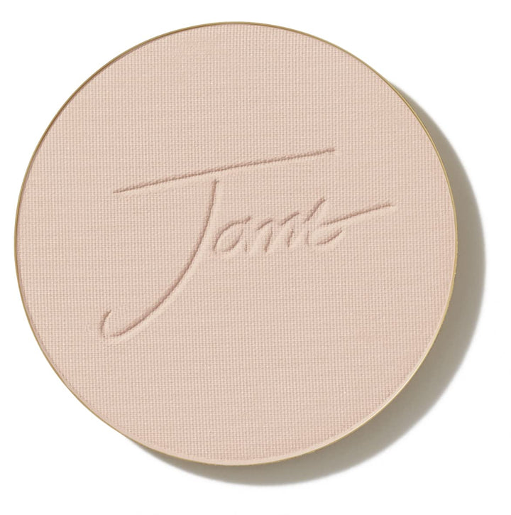 jane iredale front view of light beige refill pan showing smooth pressed surface and benefit: even coverage