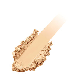 jane iredale powder being applied with brush demonstrating natural coverage benefit