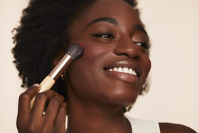 jane iredale brush applying blush showing easy application and buildable coverage
