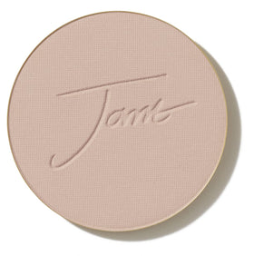 jane iredale pressed foundation refill pan showing smooth matte finish and travel convenience
