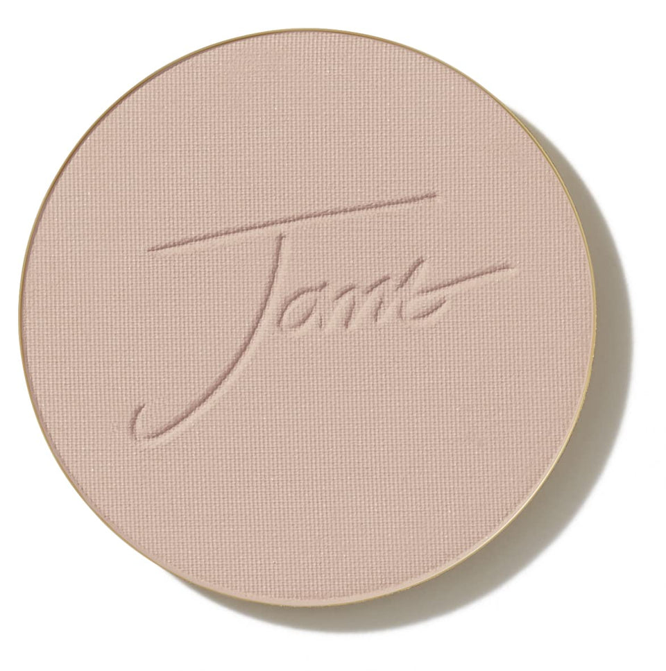 jane iredale pressed foundation refill pan showing smooth matte finish and travel convenience