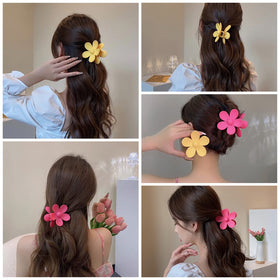JANFUN clip worn in side profile on long hair illustrating secure hold