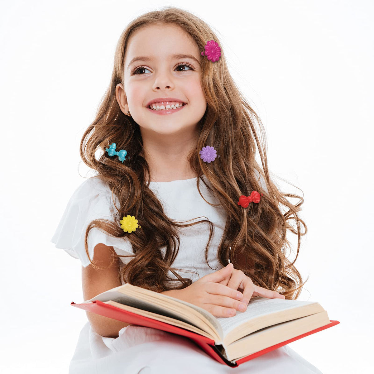 Janinka clips worn in toddler braids adding playful color to hairstyle