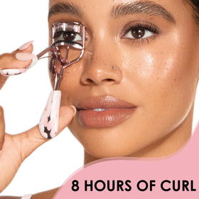 JAPONESQUE curler next to makeup brush showing size and scale advantage