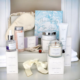 Jasmyn & Greene sleep mask and hand balm flatlay, supports restful sleep and soft hands