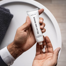 Open jar of JAXON LANE showing cream consistency and ready-to-use daily dose