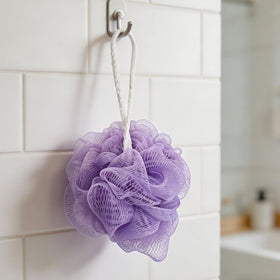 Jegruda hanging on shower hook demonstrating quick air-dry and convenience