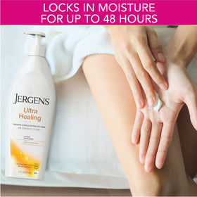 Jergens 21 fl oz bottle held in hand for size and scale