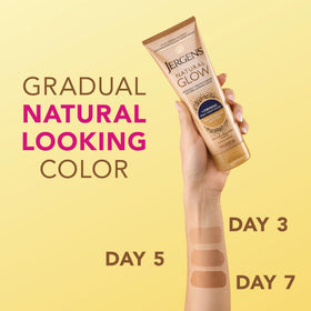 Applying Jergens on forearm to show even application and natural color